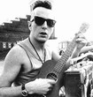 Joe Strummer with a ukulele - DR